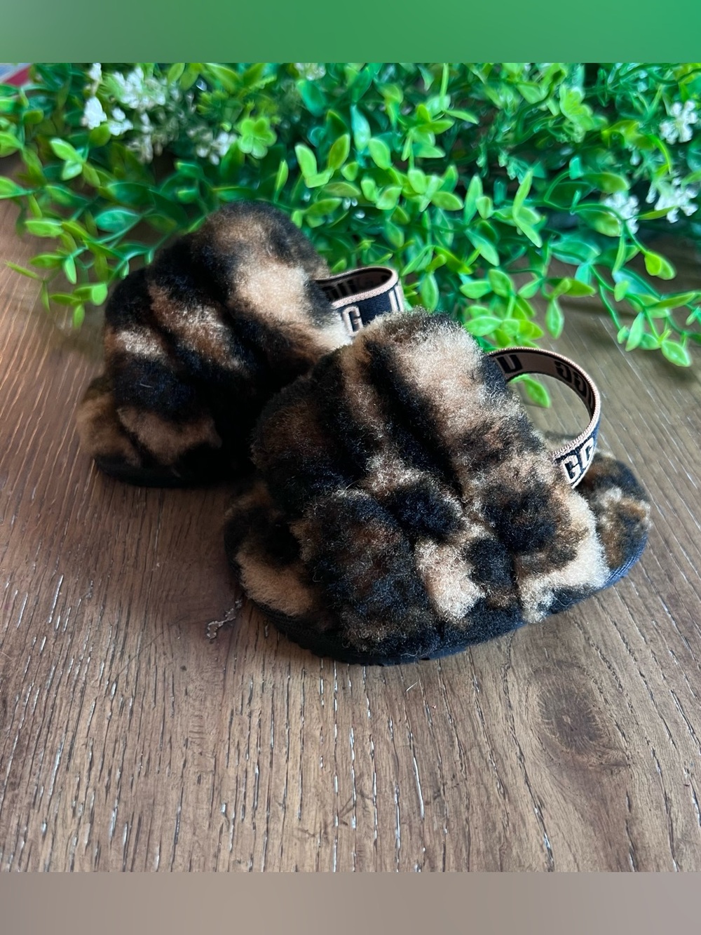 UGG Leopard Print Fuzzy Baby Slippers in Brown and Black